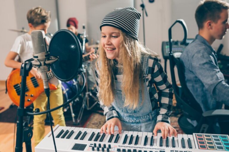 Stage 2 Studios Kids,rock,band,playing,instruments,in,music,studio