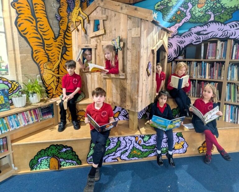 Batheaston Church school opens a magical new library designed by local artists, featuring murals, cosy reading spaces and a bespoke indoor treehouse.